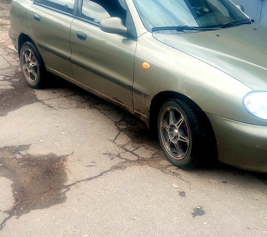 Сірий Деу Ланос, об'ємом двигуна 1.3 л та пробігом 200 тис. км за 1750 $, фото 3 на Automoto.ua