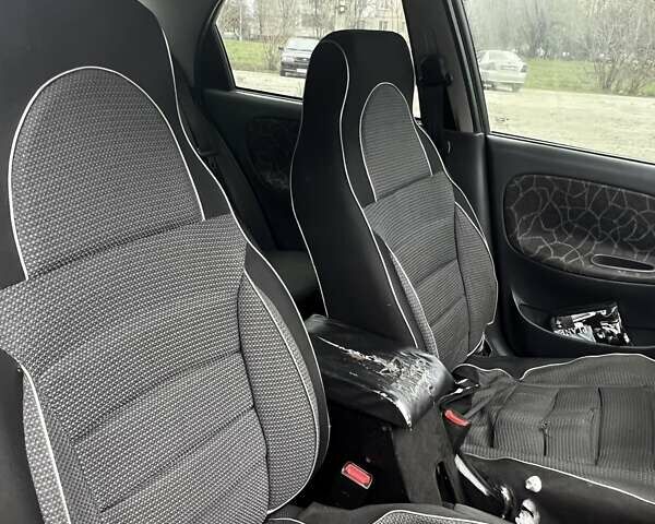 Сірий Деу Ланос, об'ємом двигуна 1.5 л та пробігом 240 тис. км за 1896 $, фото 6 на Automoto.ua