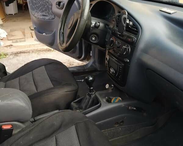 Серый Дэу Ланос, объемом двигателя 1.5 л и пробегом 265 тыс. км за 3000 $, фото 17 на Automoto.ua