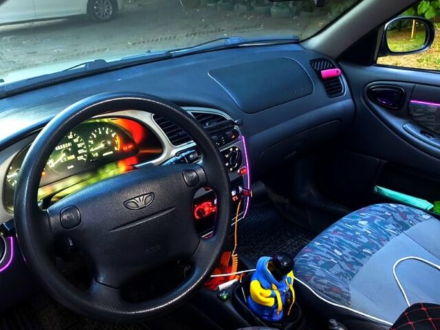 Сірий Деу Ланос, об'ємом двигуна 1.6 л та пробігом 287 тис. км за 3200 $, фото 11 на Automoto.ua