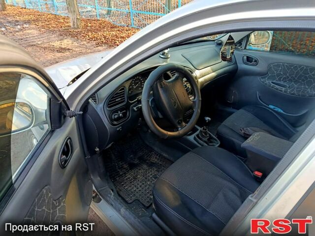 Серый Дэу Ланос, объемом двигателя 1.6 л и пробегом 340 тыс. км за 2000 $, фото 6 на Automoto.ua