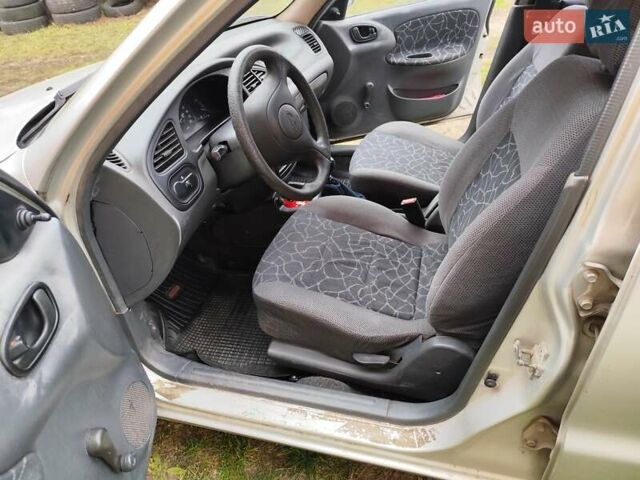 Серый Дэу Ланос, объемом двигателя 1.5 л и пробегом 298 тыс. км за 1850 $, фото 16 на Automoto.ua