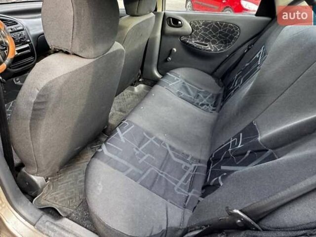 Серый Дэу Ланос, объемом двигателя 1.5 л и пробегом 200 тыс. км за 1350 $, фото 2 на Automoto.ua