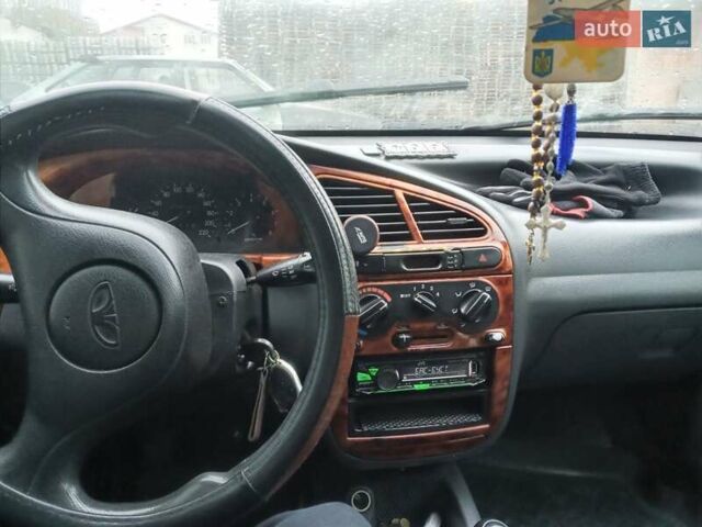 Серый Дэу Ланос, объемом двигателя 1.5 л и пробегом 350 тыс. км за 2400 $, фото 18 на Automoto.ua