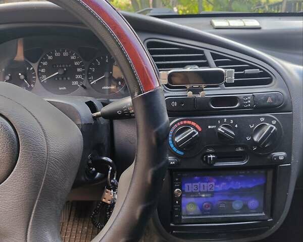 Серый Дэу Ланос, объемом двигателя 1.5 л и пробегом 300 тыс. км за 1750 $, фото 17 на Automoto.ua