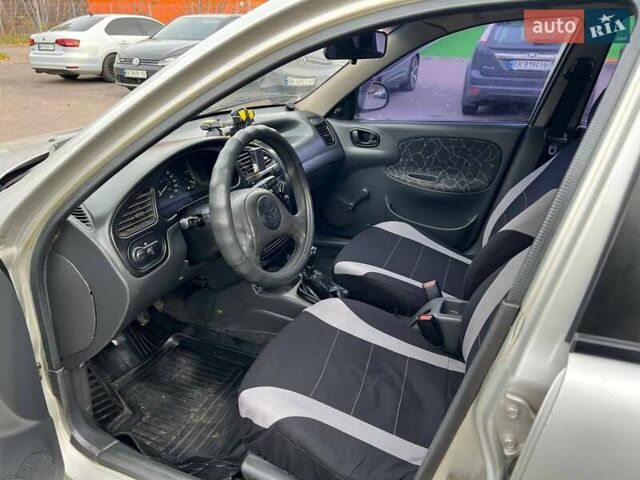 Сірий Деу Ланос, об'ємом двигуна 1.5 л та пробігом 297 тис. км за 1850 $, фото 2 на Automoto.ua