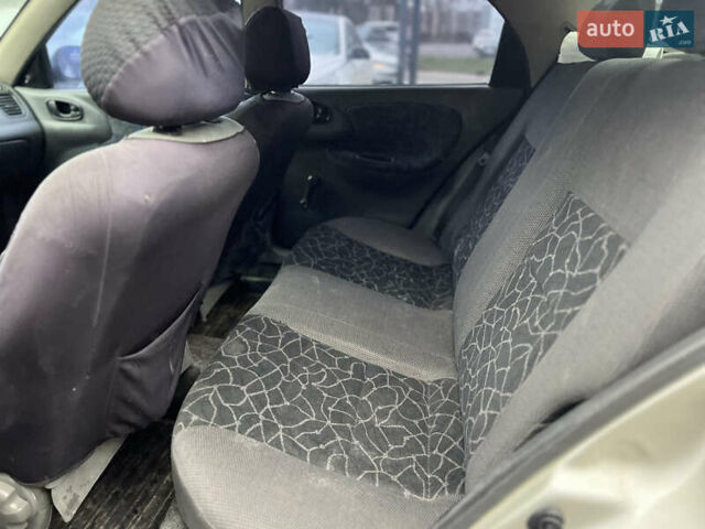 Серый Дэу Ланос, объемом двигателя 1.6 л и пробегом 290 тыс. км за 1400 $, фото 11 на Automoto.ua