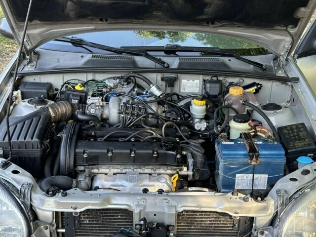 Дэу Ланос 2003 в Запорожье на Automoto.ua Серый Дэу Ланос, объемом двигателя 1.6 л и пробегом 311 тыс. км за 2500 $, фото 7 на Automoto.ua