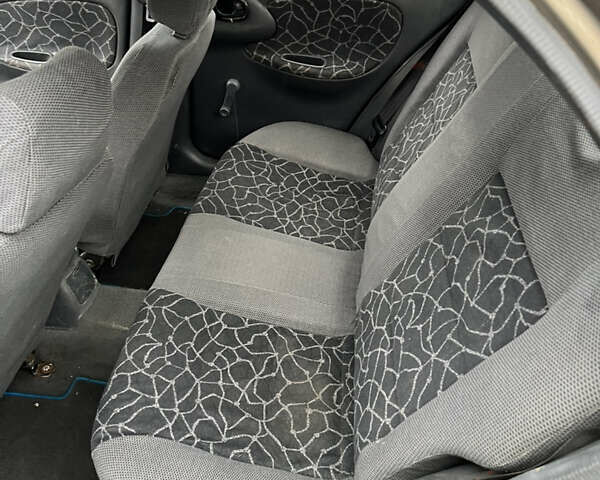 Серый Дэу Ланос, объемом двигателя 1.5 л и пробегом 235 тыс. км за 1450 $, фото 11 на Automoto.ua