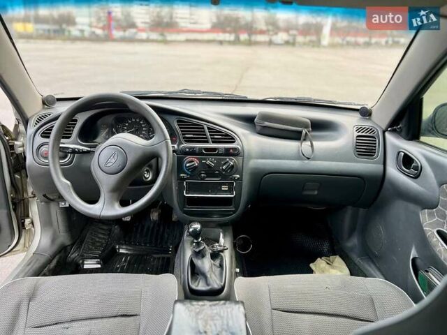 Серый Дэу Ланос, объемом двигателя 1.5 л и пробегом 218 тыс. км за 2399 $, фото 7 на Automoto.ua