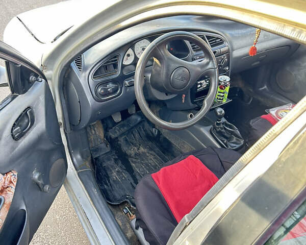 Серый Дэу Ланос, объемом двигателя 1.3 л и пробегом 250 тыс. км за 700 $, фото 6 на Automoto.ua