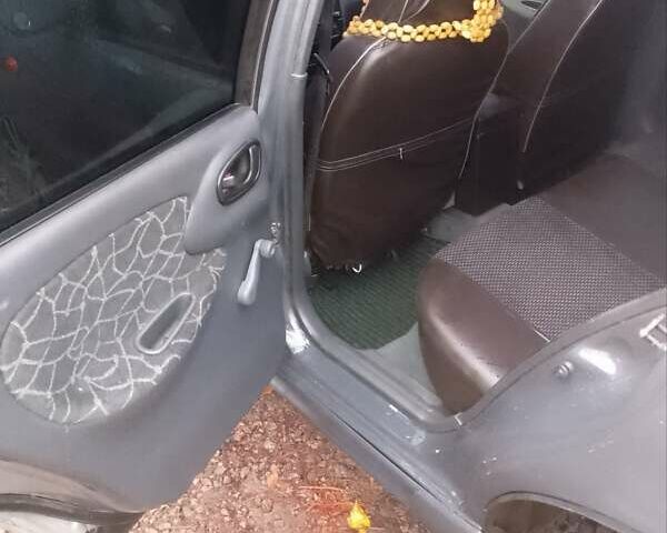 Серый Дэу Ланос, объемом двигателя 1.5 л и пробегом 207 тыс. км за 2000 $, фото 3 на Automoto.ua