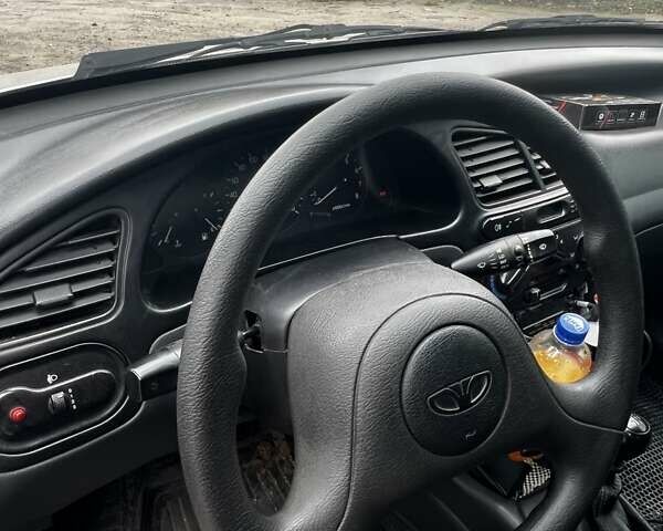 Сірий Деу Ланос, об'ємом двигуна 1.5 л та пробігом 240 тис. км за 1896 $, фото 7 на Automoto.ua