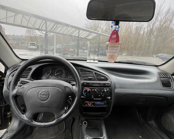 Серый Дэу Ланос, объемом двигателя 1.5 л и пробегом 235 тыс. км за 1450 $, фото 9 на Automoto.ua