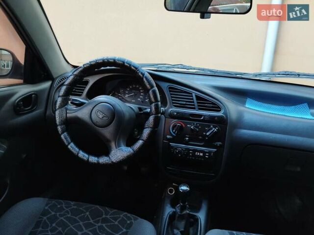 Серый Дэу Ланос, объемом двигателя 1.5 л и пробегом 350 тыс. км за 1550 $, фото 2 на Automoto.ua