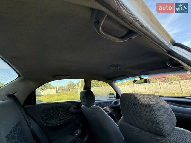 Сірий Деу Ланос, об'ємом двигуна 1.5 л та пробігом 170 тис. км за 2299 $, фото 12 на Automoto.ua