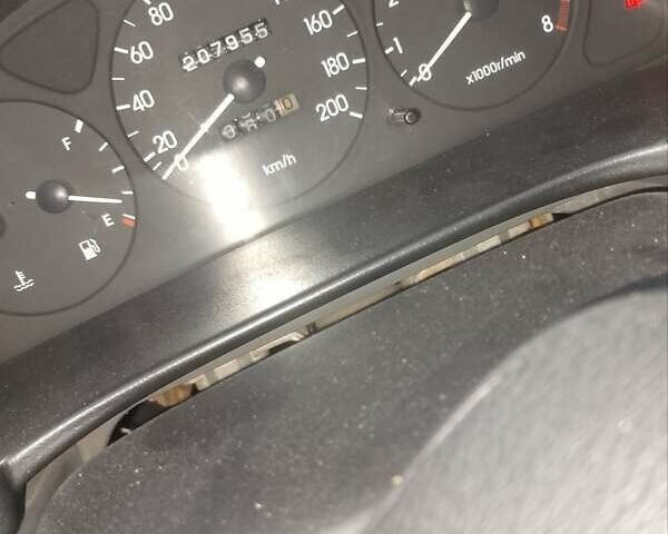 Серый Дэу Ланос, объемом двигателя 1.5 л и пробегом 207 тыс. км за 2000 $, фото 6 на Automoto.ua