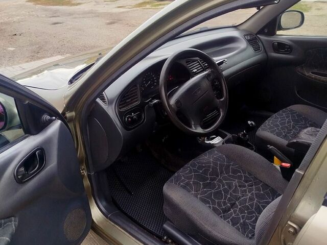Сірий Деу Ланос, об'ємом двигуна 1.6 л та пробігом 0 тис. км за 1600 $, фото 2 на Automoto.ua