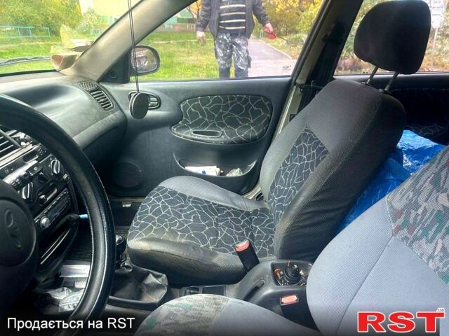 Сірий Деу Ланос, об'ємом двигуна 1.5 л та пробігом 238 тис. км за 2200 $, фото 4 на Automoto.ua