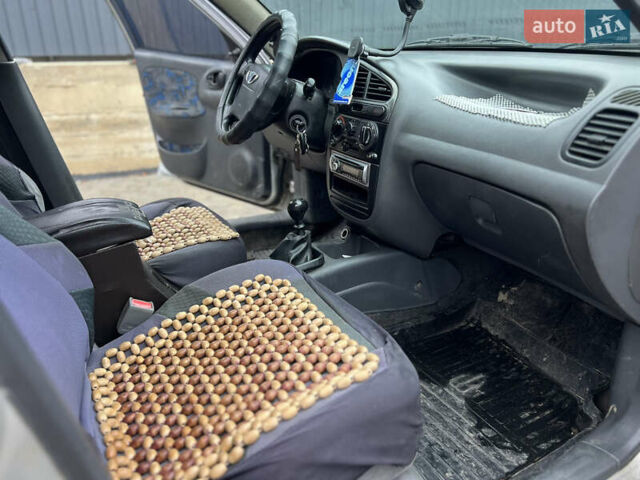 Серый Дэу Ланос, объемом двигателя 1.6 л и пробегом 290 тыс. км за 1400 $, фото 12 на Automoto.ua