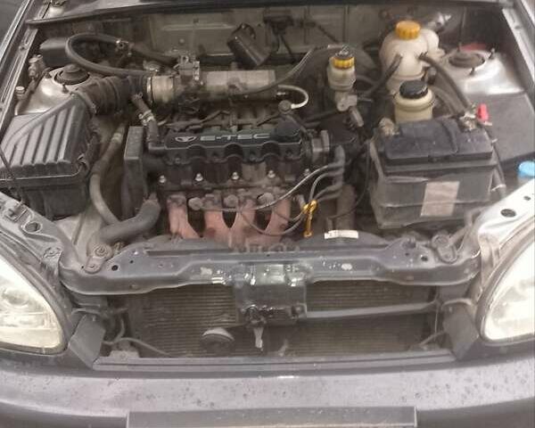 Серый Дэу Ланос, объемом двигателя 1.5 л и пробегом 207 тыс. км за 2000 $, фото 5 на Automoto.ua