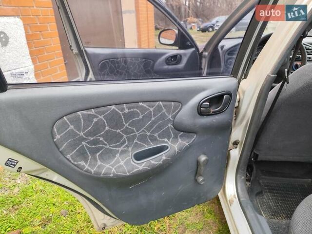 Серый Дэу Ланос, объемом двигателя 1.5 л и пробегом 298 тыс. км за 1850 $, фото 18 на Automoto.ua