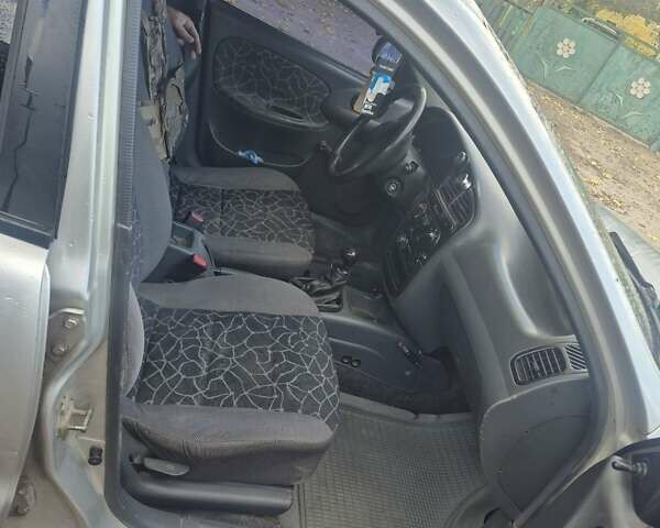 Дэу Ланос 2003 в Новомосковске на Automoto.ua Серый Дэу Ланос, объемом двигателя 1.5 л и пробегом 220 тыс. км за 2200 $, фото 9 на Automoto.ua