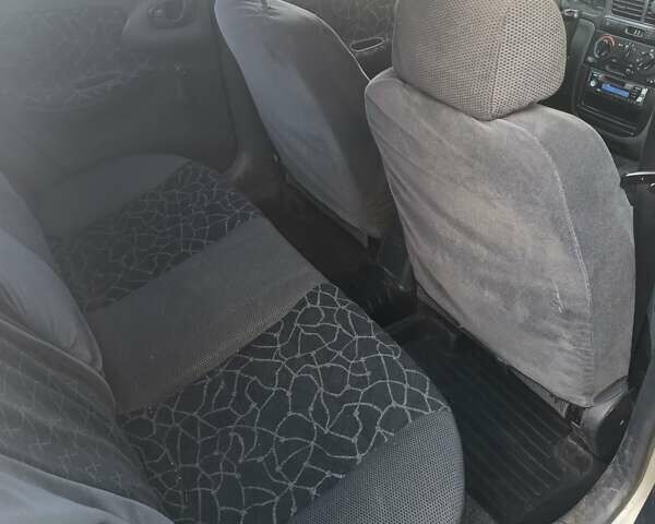 Сірий Деу Ланос, об'ємом двигуна 1.5 л та пробігом 317 тис. км за 2400 $, фото 9 на Automoto.ua