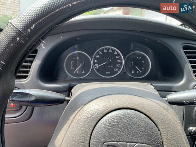 Дэу Ланос 2003 в Кривом Роге на Automoto.ua Серый Дэу Ланос, объемом двигателя 1.5 л и пробегом 276 тыс. км за 1800 $, фото 4 на Automoto.ua