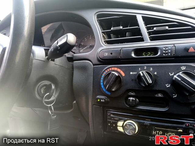 Серый Дэу Ланос, объемом двигателя 1.6 л и пробегом 300 тыс. км за 1700 $, фото 1 на Automoto.ua