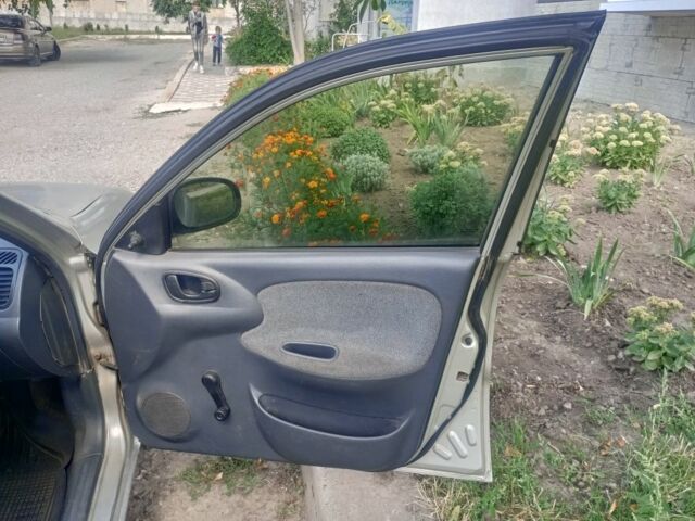 Сірий Деу Ланос, об'ємом двигуна 1.5 л та пробігом 100 тис. км за 1300 $, фото 5 на Automoto.ua