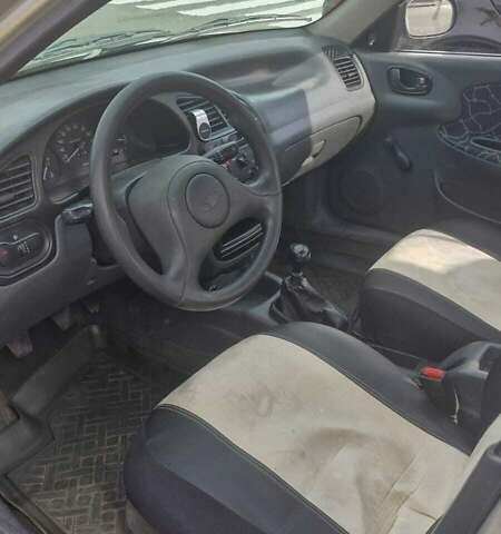 Серый Дэу Ланос, объемом двигателя 1.5 л и пробегом 220 тыс. км за 2200 $, фото 5 на Automoto.ua