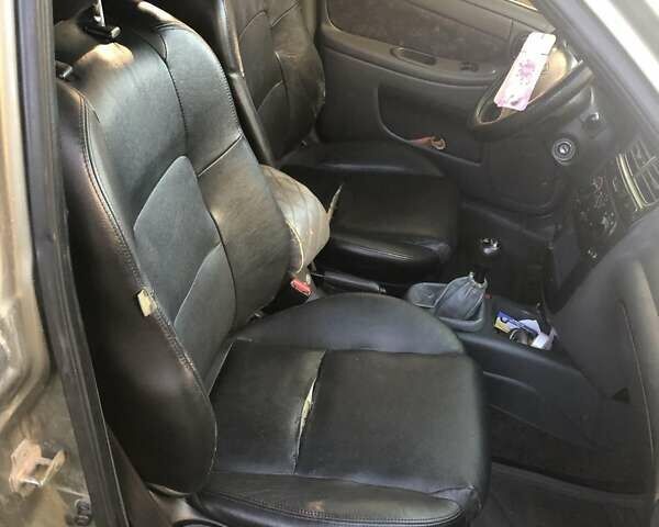 Сірий Деу Ланос, об'ємом двигуна 1.5 л та пробігом 220 тис. км за 1500 $, фото 4 на Automoto.ua