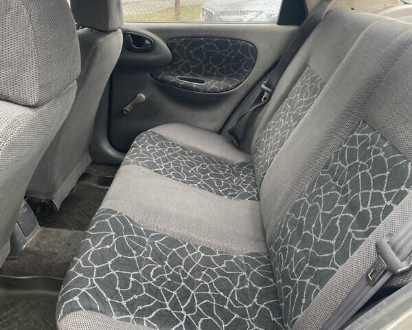 Сірий Деу Ланос, об'ємом двигуна 1.5 л та пробігом 329 тис. км за 1250 $, фото 10 на Automoto.ua
