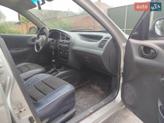 Сірий Деу Ланос, об'ємом двигуна 1.5 л та пробігом 455 тис. км за 2000 $, фото 9 на Automoto.ua