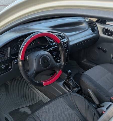 Деу Ланос 2004 у Старокостянтинів на Automoto.ua Сірий Деу Ланос, об'ємом двигуна 1.5 л та пробігом 183 тис. км за 2100 $, фото 12 на Automoto.ua