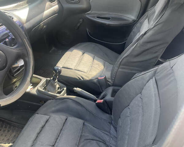 Сірий Деу Ланос, об'ємом двигуна 1.5 л та пробігом 250 тис. км за 999 $, фото 6 на Automoto.ua