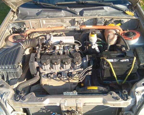 Деу Ланос 2004 у Новой Ушице на Automoto.ua Сірий Деу Ланос, об'ємом двигуна 1.5 л та пробігом 203 тис. км за 1700 $, фото 6 на Automoto.ua