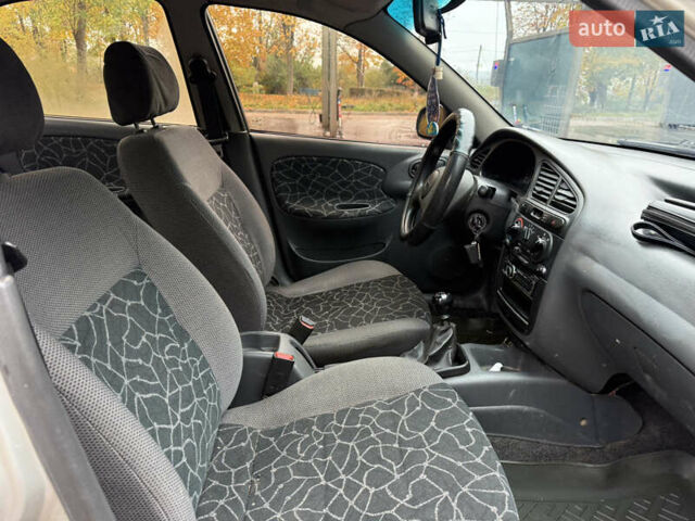 Деу Ланос 2004 у Ладижин на Automoto.ua Сірий Деу Ланос, об'ємом двигуна 1.5 л та пробігом 204 тис. км за 1850 $, фото 40 на Automoto.ua