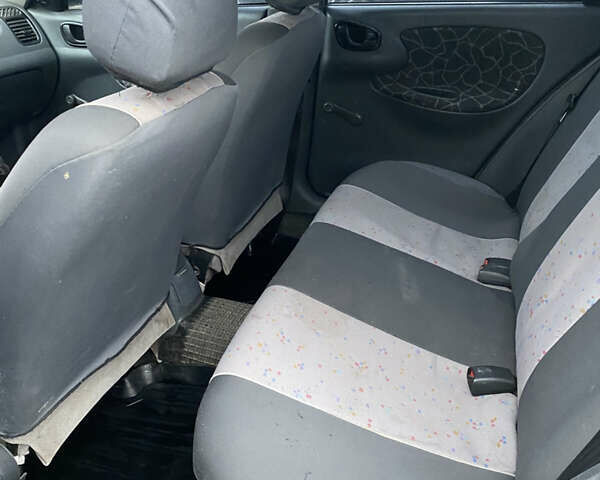 Серый Дэу Ланос, объемом двигателя 1.5 л и пробегом 205 тыс. км за 1750 $, фото 18 на Automoto.ua