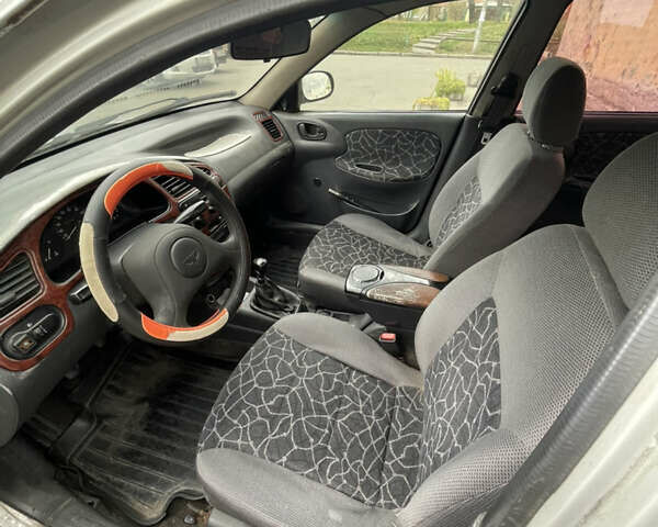 Серый Дэу Ланос, объемом двигателя 1.5 л и пробегом 301 тыс. км за 1700 $, фото 10 на Automoto.ua