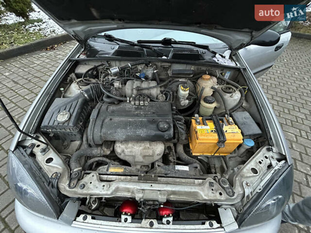 Сірий Деу Ланос, об'ємом двигуна 1.6 л та пробігом 195 тис. км за 2100 $, фото 12 на Automoto.ua
