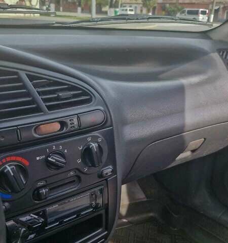 Серый Дэу Ланос, объемом двигателя 1.5 л и пробегом 220 тыс. км за 2200 $, фото 10 на Automoto.ua