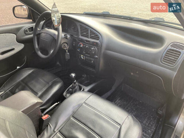 Серый Дэу Ланос, объемом двигателя 1.5 л и пробегом 313 тыс. км за 3200 $, фото 13 на Automoto.ua