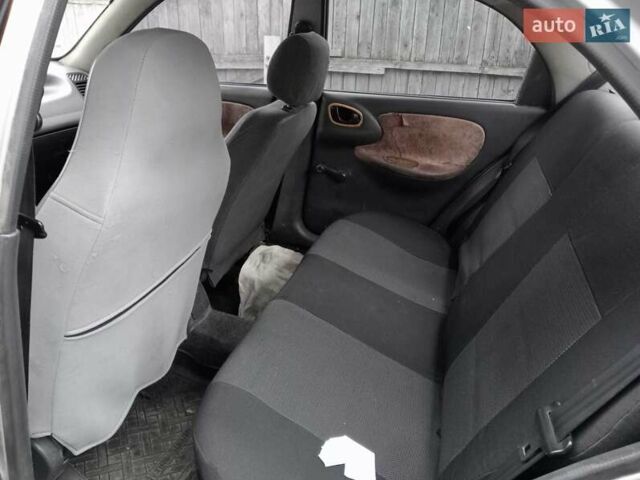 Серый Дэу Ланос, объемом двигателя 1.5 л и пробегом 381 тыс. км за 1500 $, фото 9 на Automoto.ua