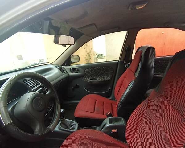 Серый Дэу Ланос, объемом двигателя 1.5 л и пробегом 196 тыс. км за 1000 $, фото 5 на Automoto.ua