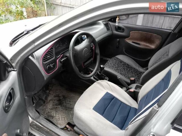 Серый Дэу Ланос, объемом двигателя 1.5 л и пробегом 381 тыс. км за 1500 $, фото 7 на Automoto.ua