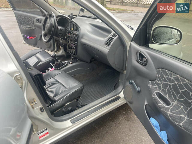 Серый Дэу Ланос, объемом двигателя 1.6 л и пробегом 320 тыс. км за 2599 $, фото 11 на Automoto.ua
