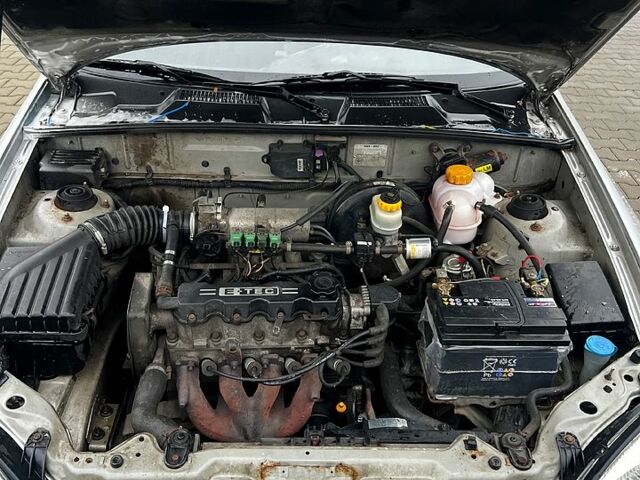 Серый Дэу Ланос, объемом двигателя 1.5 л и пробегом 300 тыс. км за 1300 $, фото 8 на Automoto.ua