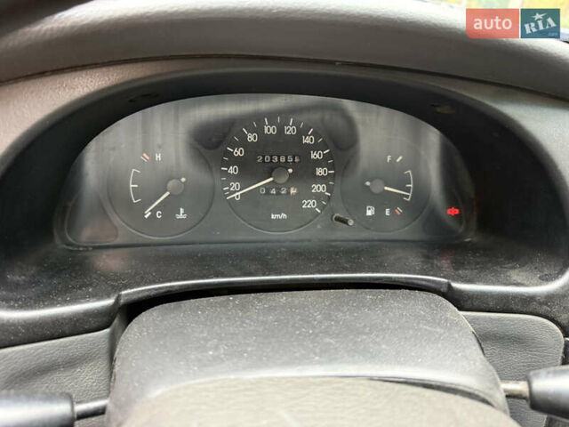 Деу Ланос 2004 у Ладижин на Automoto.ua Сірий Деу Ланос, об'ємом двигуна 1.5 л та пробігом 204 тис. км за 1850 $, фото 29 на Automoto.ua